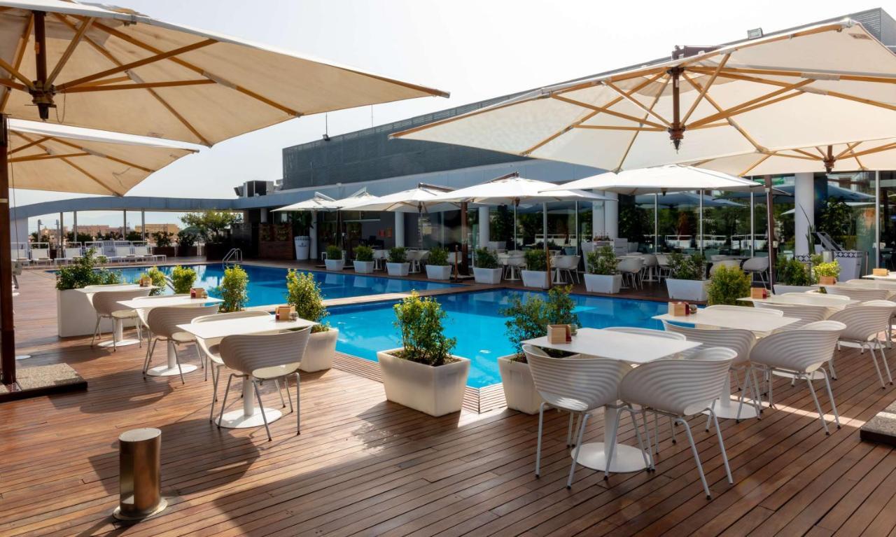 Radisson Blu Es. Hotel, Roma Extérieur photo The pool at the hotel